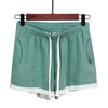 Running Shorts-Sporty running shorts with pocket-stone green